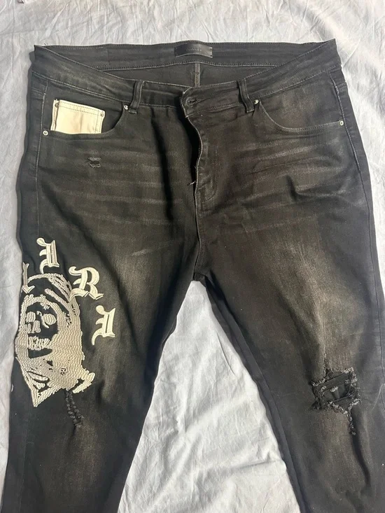 AMIRI Black Skinny Jeans with White Graphic Detailing - Men's - Picture 5 of 16